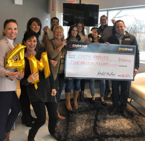 CARSTAR team holding CF check 